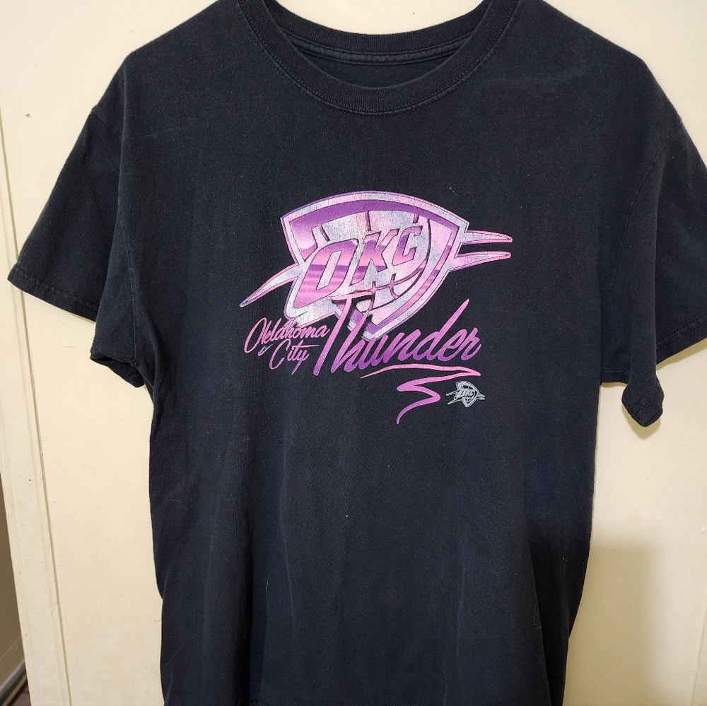 NBA OKC Thunder Shirt with pink lettering.